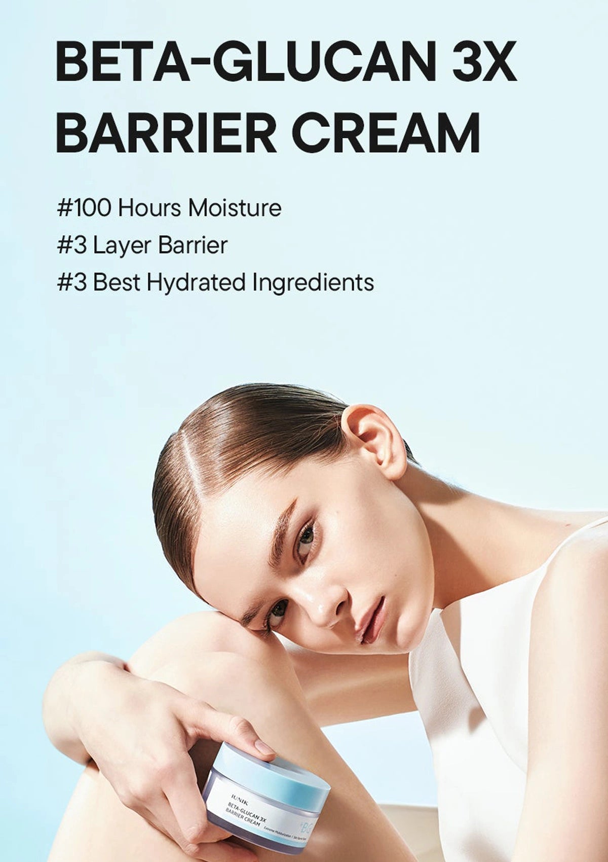 iUNIK Beta-Glucan 3X Barrier Cream 50ml โ Woman holding a jar of Beta-Glucan 3X Barrier Cream with product features listed above.